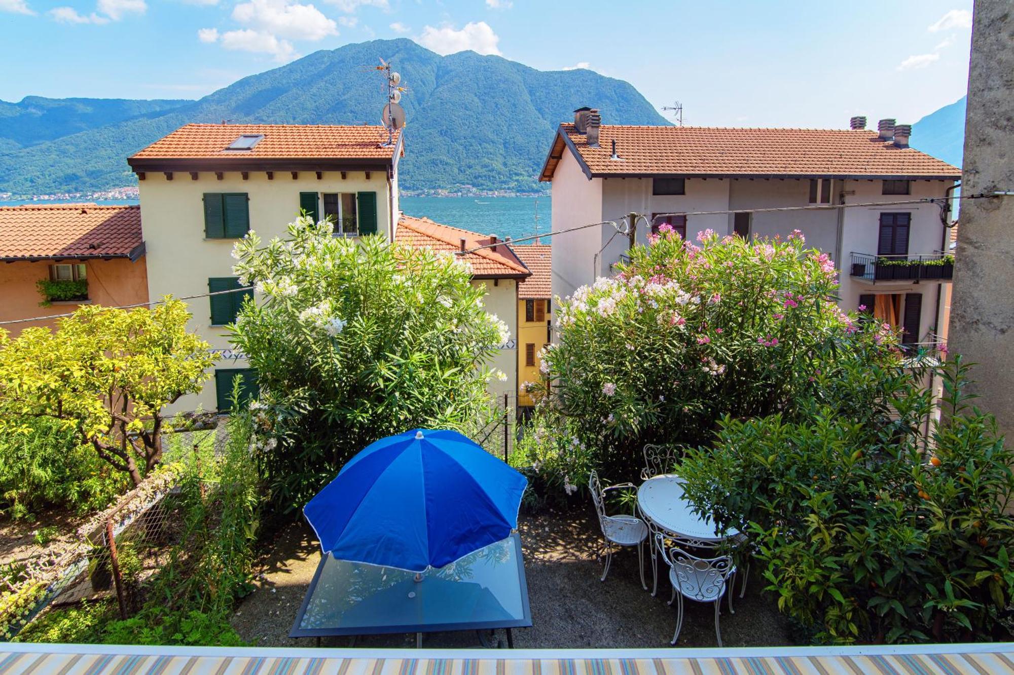 Delizioso Bilocale Vista Lago Colonno Bagian luar foto
